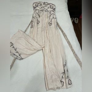 Free people white jumpsuit with flower detailing size small